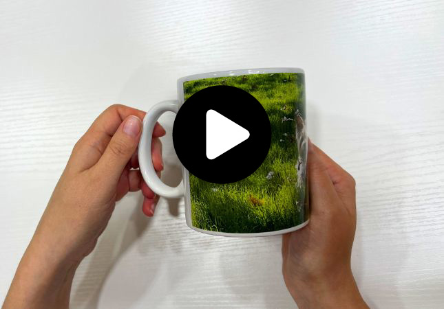 Unboxing of a personalized white mug with a photo